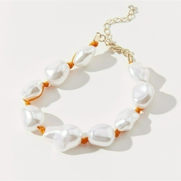 NWOT URBAN OUTFITTERS PEARL BRACELET ORANGE CORD MILEY PEARL CORDED WHITE UO - Picture 1 of 2